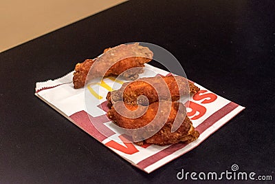 Chicken Hot Wings in McDonald restaurant Editorial Stock Photo