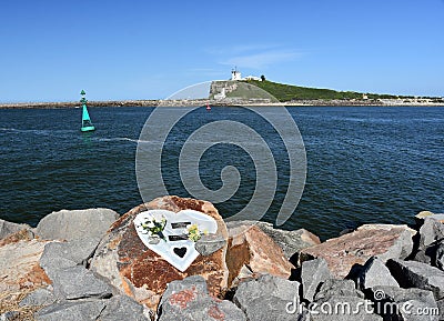 Nobbys Lighthouse, view from Shipwreck breakwall Editorial Stock Photo