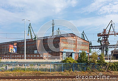 Stocznia Gdanska Gdansk Shipyard, view of the prefabrication workshop and heavy cranes. Editorial Stock Photo