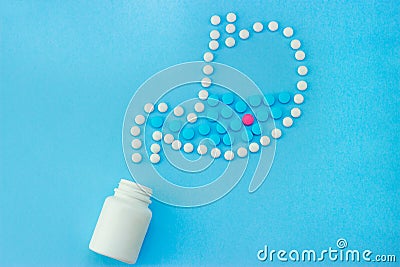 Stomach made of white pills with some red and blue pills inside Stock Photo