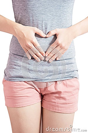 Stomachache in a woman isolated on white background. Clipping path on white background. Stock Photo