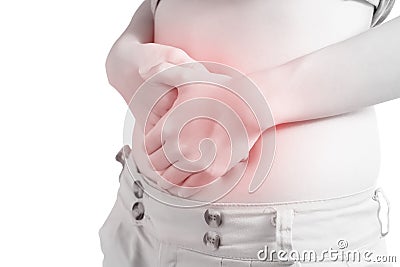 Stomachache in a woman isolated on white background. Clipping path on white background. Stock Photo