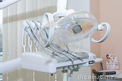 Stomatological instrument in the dentists clinic. Dental background: work in clinic, tooth replacement.dental equipment Stock Photo