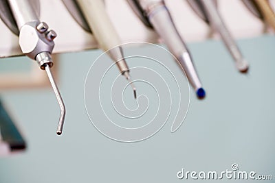 Stomatological instrument in the dentists clinic. Operation, tooth replacement. Stock Photo