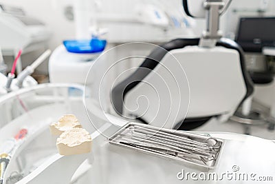 Stomatological tools in the dentists clinic. Dental work in clinic. Operation, tooth replacement. Medicine, health Stock Photo