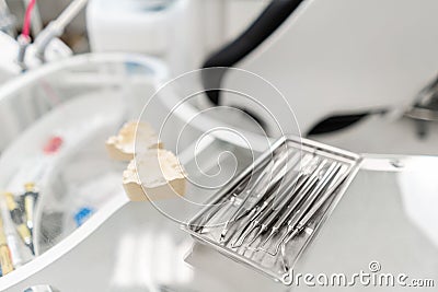 Stomatological tools in the dentists clinic. Dental work in clinic. Operation, tooth replacement. Medicine, health Stock Photo