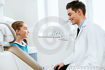 Stomatology. Dentistry Doctor And Patient In Dentist Office Stock Photo