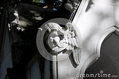 Stone angel carving with wings Stock Photo