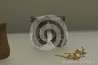 Stone animal mold with gold melted to show how ancient indigenous made golden figures Editorial Stock Photo