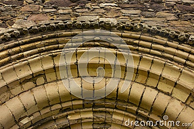 Stone arch on an entrance to a medieval abbey ruin. Stock Photo