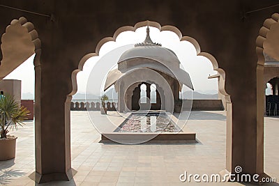 Stone arch on pillars of a fort Stock Photo