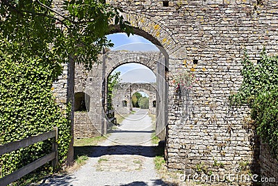 Stone arches entree of fortified castle Stock Photo