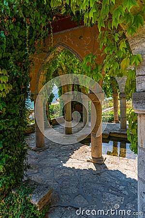 Stone arches of a garden pavilion in Royal Palace in Balchik, Bulgaria Stock Photo