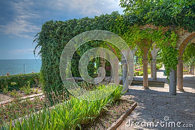 Stone arches of a garden pavilion in Royal Palace in Balchik, Bulgaria Stock Photo