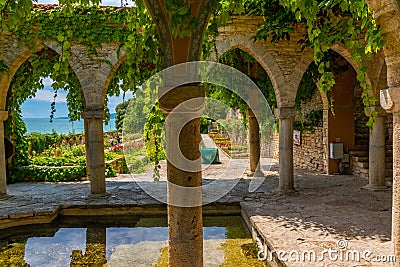 Stone arches of a garden pavilion in Royal Palace in Balchik, Bulgaria Stock Photo