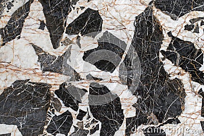 Stone background texture photo of Gabbro pegmatite rock with black and white crystals patterns Stock Photo