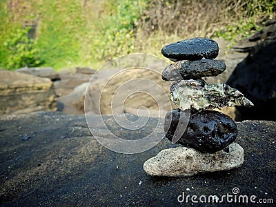 Stone balancing background. Life balance brings harmony concept. Zen like balanced stone tower with copy space. Stock Photo