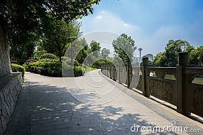 Stone balustraded riverside in city at sunny summer noon Stock Photo