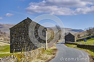 Stone barns in countryside Stock Photo