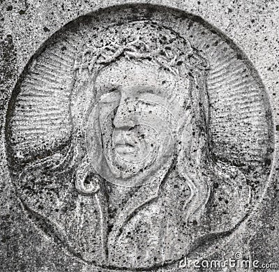 Stone Bas-relief of the face of Christ Stock Photo