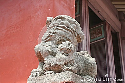 The stone beasts inside the Tainan Confucius Temple guard the ancient cultural relics inside. Stock Photo