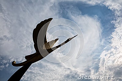 Stone bird flying over the sky of Singapur Editorial Stock Photo