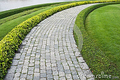 The Stone block walk path in the park Stock Photo