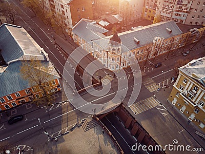 Stone Bridge in historical center of Voronezh at sunset. Old buildings and road intersection in European city downtown Stock Photo