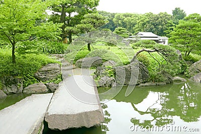Stone bridge, Japanese pavilion, Pinus thunbergii tree Stock Photo