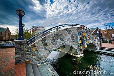 Stone bridge over Carroll Creek, in Frederick, Maryland. Stock Photo
