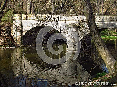 Stone bridge on river Blanice, public park in city Vlasim, central bohemia region Stock Photo