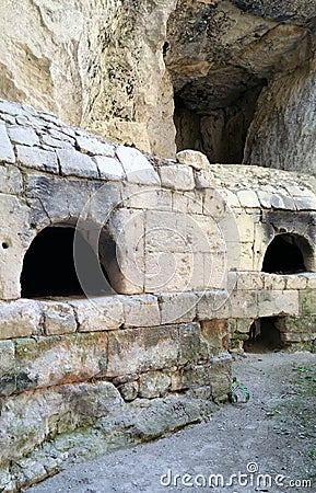Stone built ovens in tufa rock Stock Photo