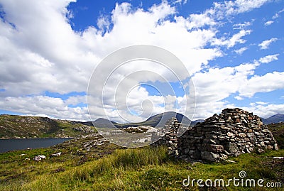 Stone built sheepfold and landscape Stock Photo