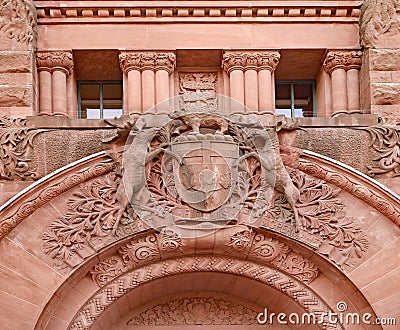 Stone carving of the coat of arms of the Province of Ontario Stock Photo