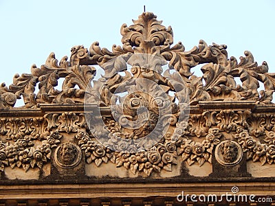 Stone carving at the top of a gate of a palace in India. Stock Photo