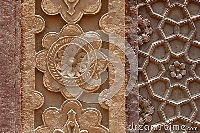Stone carvings on the wall of a temple in India Stock Photo
