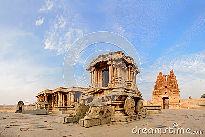 Stone chariot in Hampi Vittala Temple at sunset Stock Photo