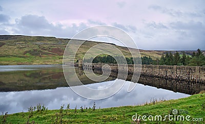 The stone dam of Scar House Reservoir in Nidderdale, Yorkshire, England, UK Editorial Stock Photo
