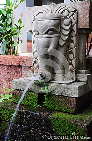 Stone elephant water fountain Stock Photo