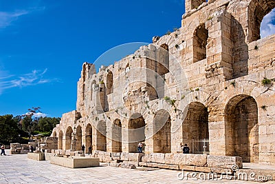 Stone facade and arcades of Odeon of Herodes Atticus Roman theater, Herodeion or Herodion, at slope of Athenian Acropolis hill in Editorial Stock Photo