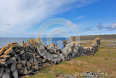 Stone fence on the Atlantic coast of Ireland Stock Photo