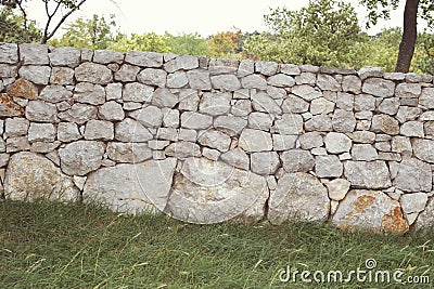 Stone fence tilted Stock Photo