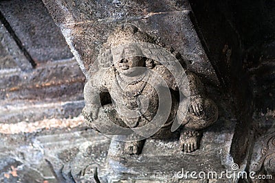 Stone figure of Bharvahaka Yaksha in Ajanta caves, India Stock Photo