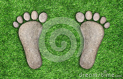 Stone footprints in the grass Stock Photo