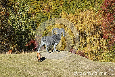 JUVAL MUSEUM, OCTOBER 18 2021, ITALY : Stone goat on the high pastures around the brooding fortress of Castle Juval, South Tyr Editorial Stock Photo