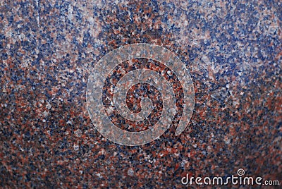 The stone granite surface. Red granite texture. Stock Photo