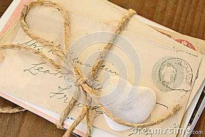 Stone heart with tied letters Stock Photo