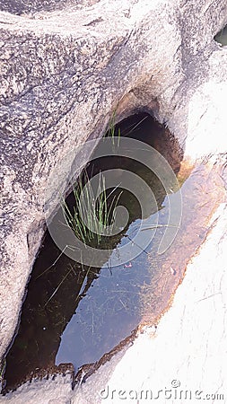 On the stone of holl and in the permanent water every time in the jharkhand . Stock Photo
