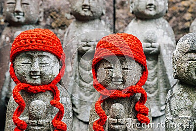 Stone Jizo buddha statue at Hasedera temple in Kamakura, Japan Stock Photo