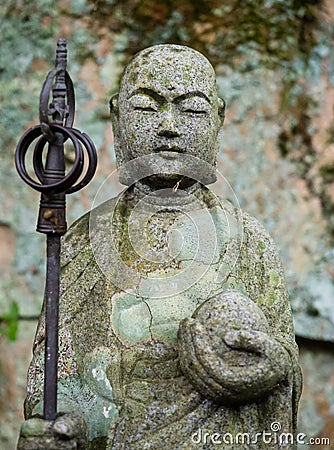 Stone Jizo statue in the mountains Stock Photo